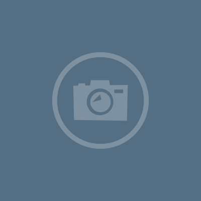 Icon Fotoapparat in weiß auf blauem Hintergrund